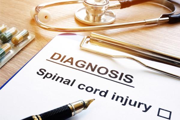 spinal cord injury lawyer collects medical information of accident victim