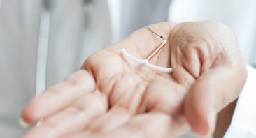 close-up of a copper T-shaped intrauterine device similar to the Paragard IUD at the center of MDL 2974.